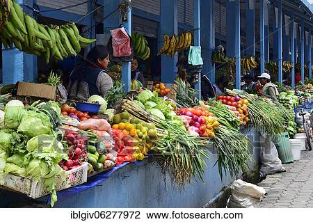 Stock Image - Colorful vegetables and fruits at the market, Otavalo, Imbabura province, Ecuador, South America. Fotosearch