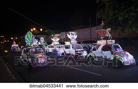 Stock Image - Colorful with LEDs illuminated cars, pedal car, Yogyakarta, Java, Indonesia, Asia. Fotosearch