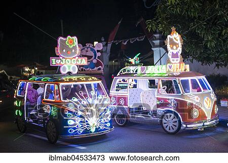 Stock Image - Colorful with LEDs illuminated cars, pedal car, Yogyakarta, Java, Indonesia, Asia. Fotosearch