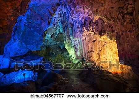 Stock Photo - Colorfully illuminated cave, Sonnenbühl, Swabian Alb, Baden-Württemberg, Germany, Europe. Fotosearch