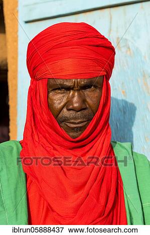 Colourful dressed bodyguard of the sultan of Agadez, Unesco world heritage sight Agadez, Niger, Africa View Large Photo Image Stock Photo - Colourful dressed bodyguard of the sultan of Agadez, Unesco world heritage sight Agadez, Niger, Africa. Fotosearch