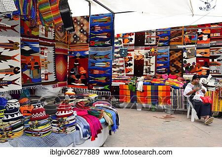 Colourful textiles at the handicraft market, Plaza de Ponchos, Otavalo, Imbabura Province, Ecuador, South America View Large Photo Image Stock Photo - Colourful textiles at the handicraft market, Plaza de Ponchos, Otavalo, Imbabura Province, Ecuador, South America. Fotosearch