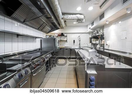 Stock Photo - Commercial kitchen in a restaurant with stainless equipment. Fotosearch