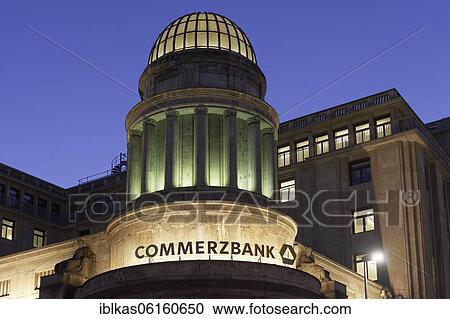 Stock Image - Commerzbank, illuminated lettering on the historic building on Kasernenstrasse, Düsseldorf, North Rhine-Westphalia, Germany, Europe. Fotosearch