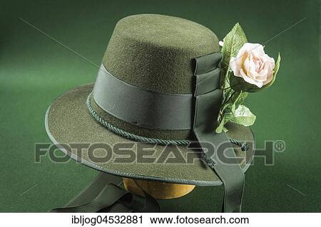 Stock Image - Completed wool felt hat, Anna Plochel Hut, with hatband and decorative flower, hatmaker workshop, Bad Aussee, Styria, Austria, Europe. Fotosearch