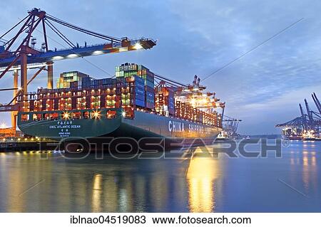 Container ship at night in the port of Hamburg, container terminal Eurogate, Hamburg, Germany, Europe View Large Photo Image Stock Image - Container ship at night in the port of Hamburg, container terminal Eurogate, Hamburg, Germany, Europe. Fotosearch