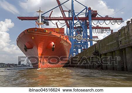 Container ship, container loading at container terminal Burchardkai, Hamburg harbor at the river Elbe, Hamburg, Germany, Europe View Large Photo Image Picture - Container ship, container loading at container terminal Burchardkai, Hamburg harbor at the river Elbe, Hamburg, Germany, Europe. Fotosearch