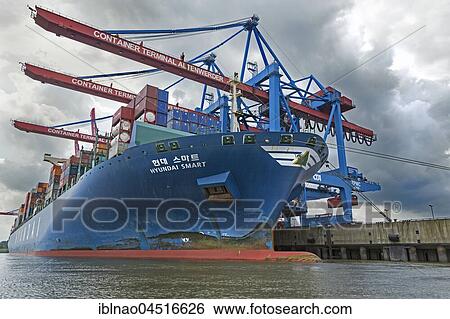Container ship Hyundai Smart, container loading at container terminal Altenwerder, Hamburg harbor at the river Elbe, Hamburg, Germany, Europe View Large Photo Image Stock Photograph - Container ship Hyundai Smart, container loading at container terminal Altenwerder, Hamburg harbor at the river Elbe, Hamburg, Germany, Europe. Fotosearch