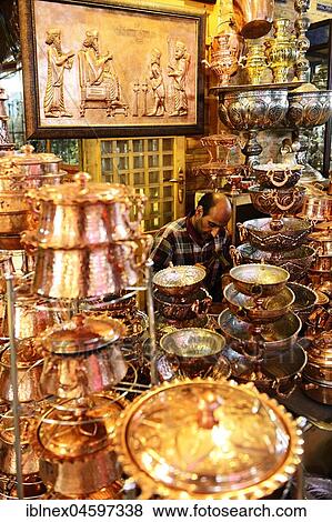 Copperworks in the bazaar under the arcades of Imam Square, Meydan-e Naqsh-e Jahan, Meydan-e Naqsh-e Jahan, Isfahan, Iran, Asia View Large Photo Image Stock Photo - Copperworks in the bazaar under the arcades of Imam Square, Meydan-e Naqsh-e Jahan, Meydan-e Naqsh-e Jahan, Isfahan, Iran, Asia. Fotosearch