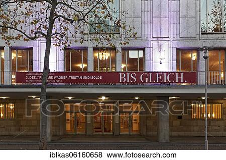 Stock Photo - Corona Lockdown, closed opera house with banner Bis gleich, Twilight, Deutsche Oper am Rhein, Düsseldorf, North Rhine-Westphalia, Germany, Europe. Fotosearch