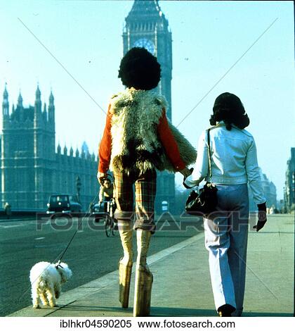 Couple in 70s outfit, platform shoes, England, Great Britain View Large Photo Image Stock Photography - Couple in 70s outfit, platform shoes, England, Great Britain. Fotosearch