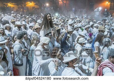 Crowd of people, white powder and white clothes, evening mood, carnival La Fiesta de los Indianos, Las Palmas de Gran Canaria, Canary Islands, Spain, Europe View Large Photo Image Stock Image - Crowd of people, white powder and white clothes, evening mood, carnival La Fiesta de los Indianos, Las Palmas de Gran Canaria, Canary Islands, Spain, Europe. Fotosearch