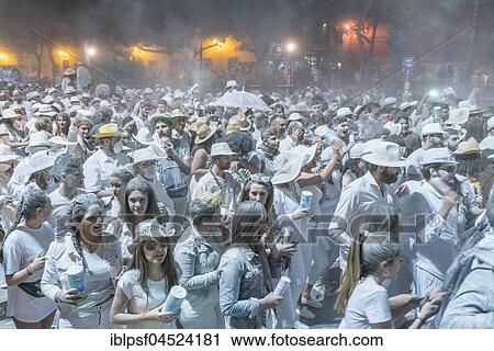 Crowd of people, white powder and white clothes, evening mood, carnival La Fiesta de los Indianos, Las Palmas de Gran Canaria, Canary Islands, Spain, Europe View Large Photo Image Stock Image - Crowd of people, white powder and white clothes, evening mood, carnival La Fiesta de los Indianos, Las Palmas de Gran Canaria, Canary Islands, Spain, Europe. Fotosearch