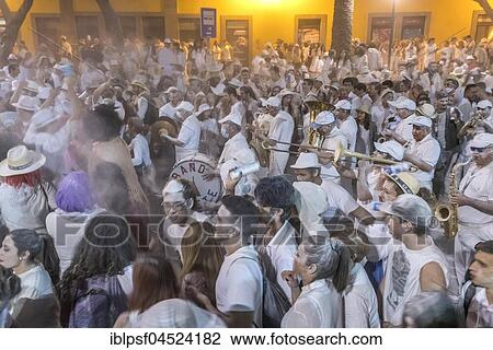 Crowd of people, white powder and white clothes, evening mood, carnival La Fiesta de los Indianos, Las Palmas de Gran Canaria, Canary Islands, Spain, Europe View Large Photo Image Stock Image - Crowd of people, white powder and white clothes, evening mood, carnival La Fiesta de los Indianos, Las Palmas de Gran Canaria, Canary Islands, Spain, Europe. Fotosearch
