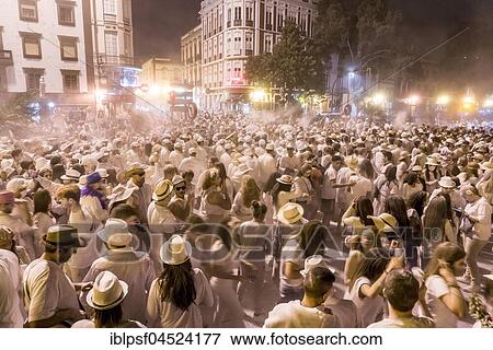 Crowd of people, white powder and white clothes, evening mood, carnival La Fiesta de los Indianos, Las Palmas de Gran Canaria, Canary Islands, Spain, Europe View Large Photo Image Stock Photo - Crowd of people, white powder and white clothes, evening mood, carnival La Fiesta de los Indianos, Las Palmas de Gran Canaria, Canary Islands, Spain, Europe. Fotosearch