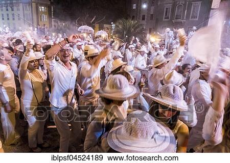 Crowd of people, white powder and white clothes, evening mood, carnival La Fiesta de los Indianos, Las Palmas de Gran Canaria, Canary Islands, Spain, Europe View Large Photo Image Stock Photo - Crowd of people, white powder and white clothes, evening mood, carnival La Fiesta de los Indianos, Las Palmas de Gran Canaria, Canary Islands, Spain, Europe. Fotosearch