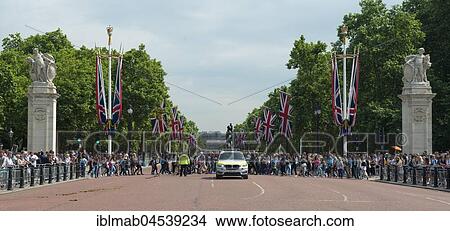 Picture - Crowd, tourists crossing street The Mall, City of Westminster, London, England, United Kingdom, Europe. Fotosearch