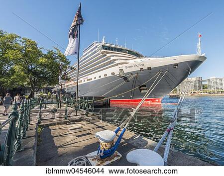Cruise ship Queen Victoria is docked in the harbor, port district of The Rocks, Sydney, New South Wales, Australia, Oceania View Large Photo Image Picture - Cruise ship Queen Victoria is docked in the harbor, port district of The Rocks, Sydney, New South Wales, Australia, Oceania. Fotosearch