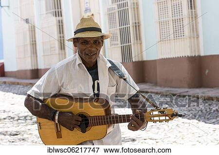Cuban street musician, Trinidad, Cuba, Central America View Large Photo Image Stock Photo - Cuban street musician, Trinidad, Cuba, Central America. Fotosearch