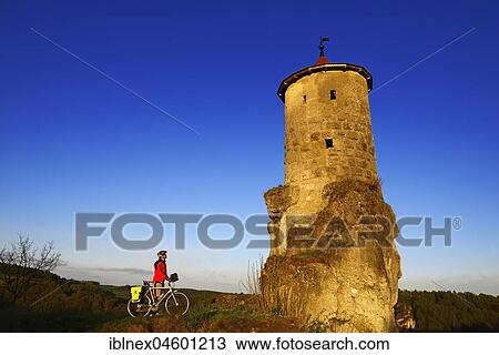 Cyclist at the Stehrturm Steinerner Beutel, near Waischenfeld, Franconian Switzerland, Upper Franconia, Bavaria, Germany, Europe View Large Photo Image Stock Image - Cyclist at the Stehrturm Steinerner Beutel, near Waischenfeld, Franconian Switzerland, Upper Franconia, Bavaria, Germany, Europe. Fotosearch