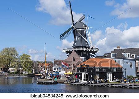 Stock Photography - De Adriaan windmill on the river Spaarne, Haarlem, North Holland, The Netherlands, Europe. Fotosearch