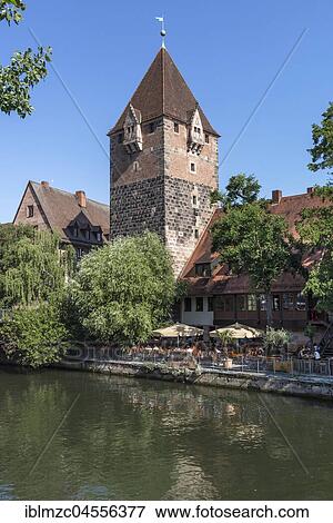 Debt tower, garden restaurant at the Pegnitz, Nuremberg, Middle Franconia, Bavaria, Germany, Europe View Large Photo Image Stock Photo - Debt tower, garden restaurant at the Pegnitz, Nuremberg, Middle Franconia, Bavaria, Germany, Europe. Fotosearch