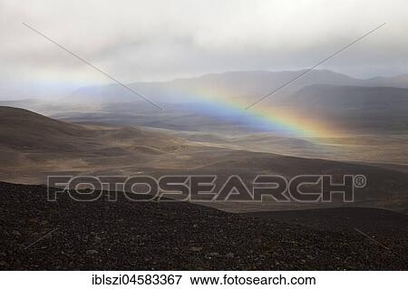 Desert-like, mountainous landscape with rainbow, Moedrudalsfjalsfjallgardur, highlands, Island View Large Photo Image Stock Photo - Desert-like, mountainous landscape with rainbow, Moedrudalsfjalsfjallgardur, highlands, Island. Fotosearch