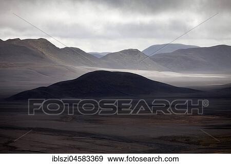 Stock Photo - Desert-like, mountainous landscape with light and shadow, Moedrudalsfjalsfjallgardur, highlands, Island. Fotosearch