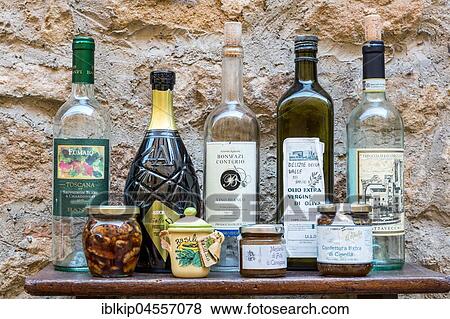 Display of Tuscan olive oil, wine and paste, Pienza, Tuscany, Italy, Europe View Large Photo Image Stock Photo - Display of Tuscan olive oil, wine and paste, Pienza, Tuscany, Italy, Europe. Fotosearch