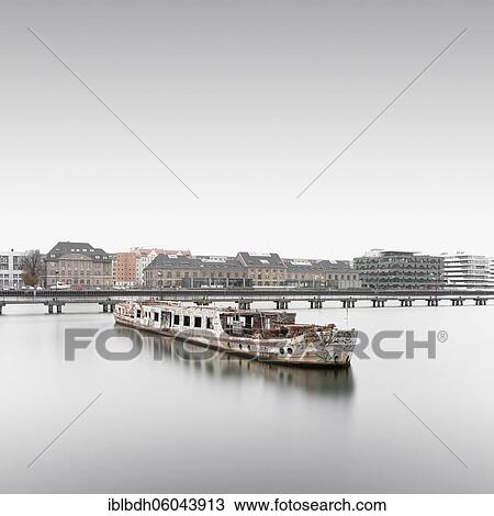 Stock Image - Dr. Ingrid Wengler, 2020, Shipwreck at the Osthafen in Berlin, Germany, Europe. Fotosearch