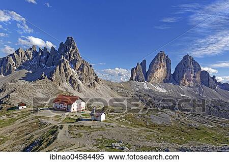 Dreizinnenhütte and chapel with view of the Paternkofel and the Three Peaks, National Park Dolomiti di Sesto, Dolomites of Sesto, Alta Pusteria, South Tyrol, Italy, Europe View Large Photo Image Stock Photography - Dreizinnenhütte and chapel with view of the Paternkofel and the Three Peaks, National Park Dolomiti di Sesto, Dolomites of Sesto, Alta Pusteria, South Tyrol, Italy, Europe. Fotosearch