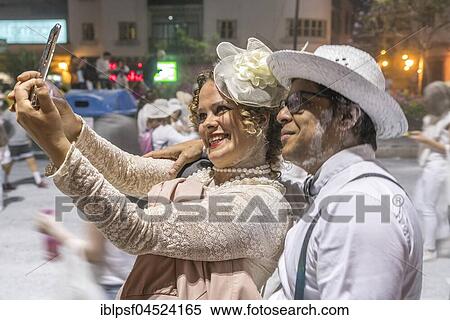 Dressed up couple, white powder and white clothes, carnival La fiesta de Los Indianos, Las Palmas de Gran Canaria, Canary Islands, Spain, Europe View Large Photo Image Stock Photography - Dressed up couple, white powder and white clothes, carnival La fiesta de Los Indianos, Las Palmas de Gran Canaria, Canary Islands, Spain, Europe. Fotosearch