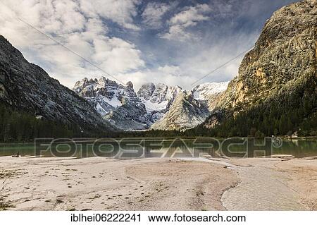 Stock Image - Drought lake, cloud atmosphere, Dolomites, Italy, Europe. Fotosearch