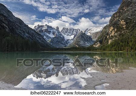 Drought lake, cloud atmosphere, reflection in water, Dolomites, Italy, Europe View Large Photo Image Stock Photo - Drought lake, cloud atmosphere, reflection in water, Dolomites, Italy, Europe. Fotosearch