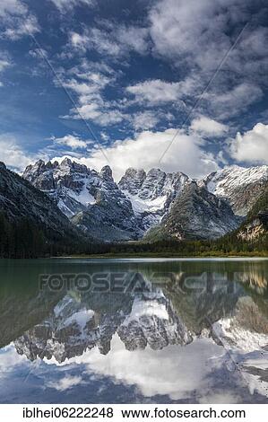 Drought lake, cloud atmosphere, reflection in water, Dolomites, Italy, Europe View Large Photo Image Stock Photo - Drought lake, cloud atmosphere, reflection in water, Dolomites, Italy, Europe. Fotosearch