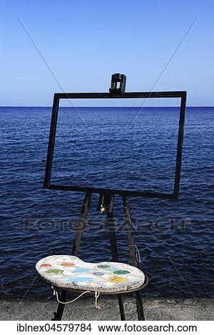 Easel and pallet in front of the sea, Vulcano Island, Lipari Islands, Italy, Europe View Large Photo Image Picture - Easel and pallet in front of the sea, Vulcano Island, Lipari Islands, Italy, Europe. Fotosearch