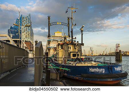 Elbphilharmonie and fishing boat, architects Herzog & De Meuron, Hafencity, Hamburg, Germany, Europe View Large Photo Image Stock Image - Elbphilharmonie and fishing boat, architects Herzog & De Meuron, Hafencity, Hamburg, Germany, Europe. Fotosearch