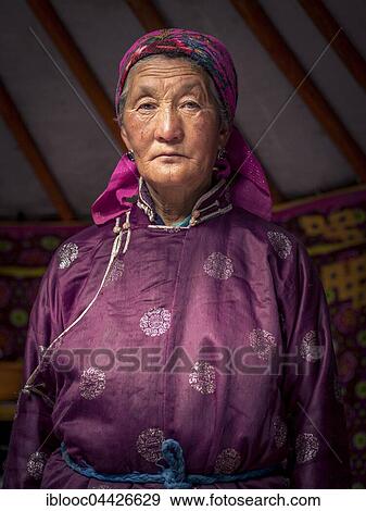 Stock Photo - Elderly woman in nomad yurt, Mongolia, Asia. Fotosearch