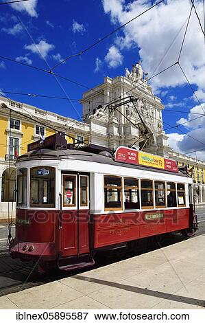Stock Photo - Electrico, tram in front of the Arc de Triomphe Arco da Rua Augusta, Praca do Comercio, Baixa, Lisbon, Portugal, Europe. Fotosearch