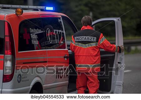 Stock Image - Emergency doctor in his emergency vehicle, Germany, Europe. Fotosearch