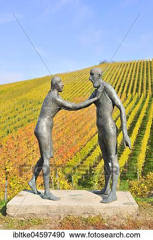 Encounter, bronze sculpture by Karl Ulrich Nuss in front of vineyards in autumn, sculpture path Strümpfelbach, Remstal, Baden-Württemberg, Germany, Europe View Large Photo Image Stock Image - Encounter, bronze sculpture by Karl Ulrich Nuss in front of vineyards in autumn, sculpture path Strümpfelbach, Remstal, Baden-Württemberg, Germany, Europe. Fotosearch