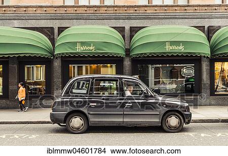 Picture - English Taxi, Harrods shopping mall, London, England, Great Britain. Fotosearch