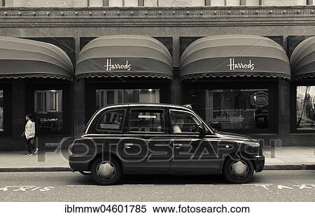 Stock Photography - English Taxi, Harrods shopping mall, London, England, Great Britain. Fotosearch