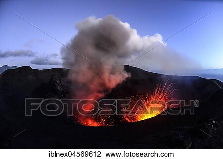 Stock Image - Eruption, volcanic eruption, twilight, Yasur volcano, Tanna Island, Vanuatu, South Seas, Oceania. Fotosearch