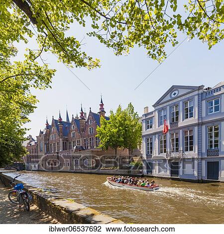Excursion boat on a canal cruise, canal, old town, Bruges, Flanders, Belgium, Europe View Large Photo Image Stock Image - Excursion boat on a canal cruise, canal, old town, Bruges, Flanders, Belgium, Europe. Fotosearch