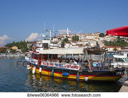 Excursion boat with tourists in the port, Adriatic coast, Vrsar, Istria, Croatia, Europe View Large Photo Image Stock Photograph - Excursion boat with tourists in the port, Adriatic coast, Vrsar, Istria, Croatia, Europe. Fotosearch
