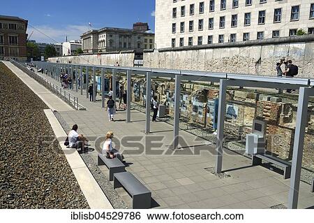 Stock Photograph - Exhibition Topography of the Terror, at back Wall Remains and the Detlev-Rohwedder House, Berlin, Germany, Europe. Fotosearch