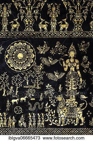 Exterior wall of the Sim prayer hall with gilded images of Apsaras, mythological animals, motifs and scenes from the Jakata tales in filigree stencil art, Wat Xieng Thong, Luang Prabang, Laos, Asia View Large Photo Image Stock Image - Exterior wall of the Sim prayer hall with gilded images of Apsaras, mythological animals, motifs and scenes from the Jakata tales in filigree stencil art, Wat Xieng Thong, Luang Prabang, Laos, Asia. Fotosearch
