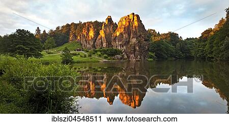 Extern stones, Externsteine, sunrise, sandstone formation, Teutoburg Forest, Horn-Bad Meinberg, North Rhine-Westphalia, Germany, Europe View Large Photo Image Stock Image - Extern stones, Externsteine, sunrise, sandstone formation, Teutoburg Forest, Horn-Bad Meinberg, North Rhine-Westphalia, Germany, Europe. Fotosearch