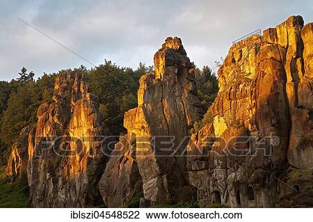 Extern stones, Externsteine, sunrise, sandstone formation, Teutoburg Forest, Horn-Bad Meinberg, North Rhine-Westphalia, Germany, Europe View Large Photo Image Stock Image - Extern stones, Externsteine, sunrise, sandstone formation, Teutoburg Forest, Horn-Bad Meinberg, North Rhine-Westphalia, Germany, Europe. Fotosearch